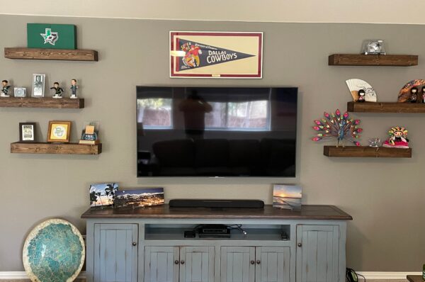 Solid wood media console in Live Weathered Nantucket Blue with Tobacco wood top
